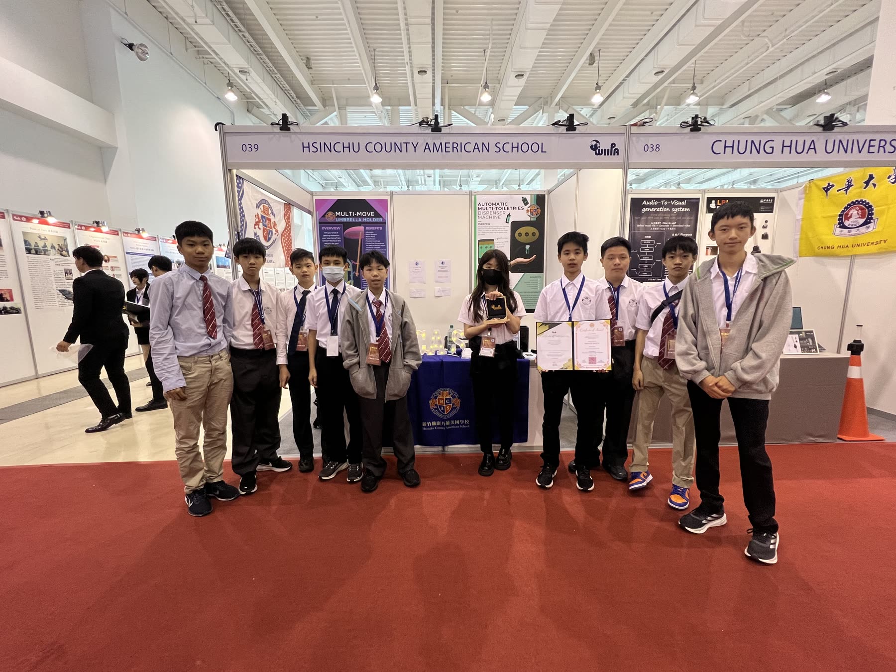 The team with their certificate and trophy